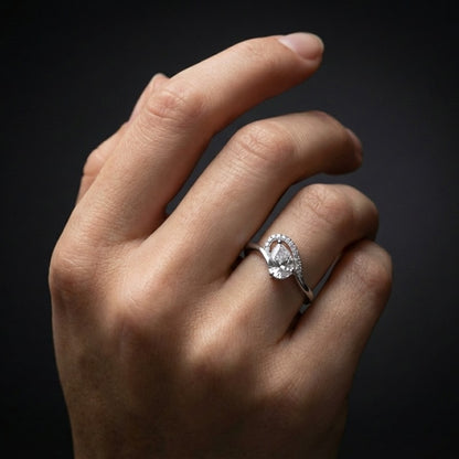 A gentle curve that flows with effortless elegance, the Celene Flow Ring captures the beauty of movement in its most refined form. The softly arched design embraces a radiant stone, creating a delicate sparkle that feels both modern and timeless.