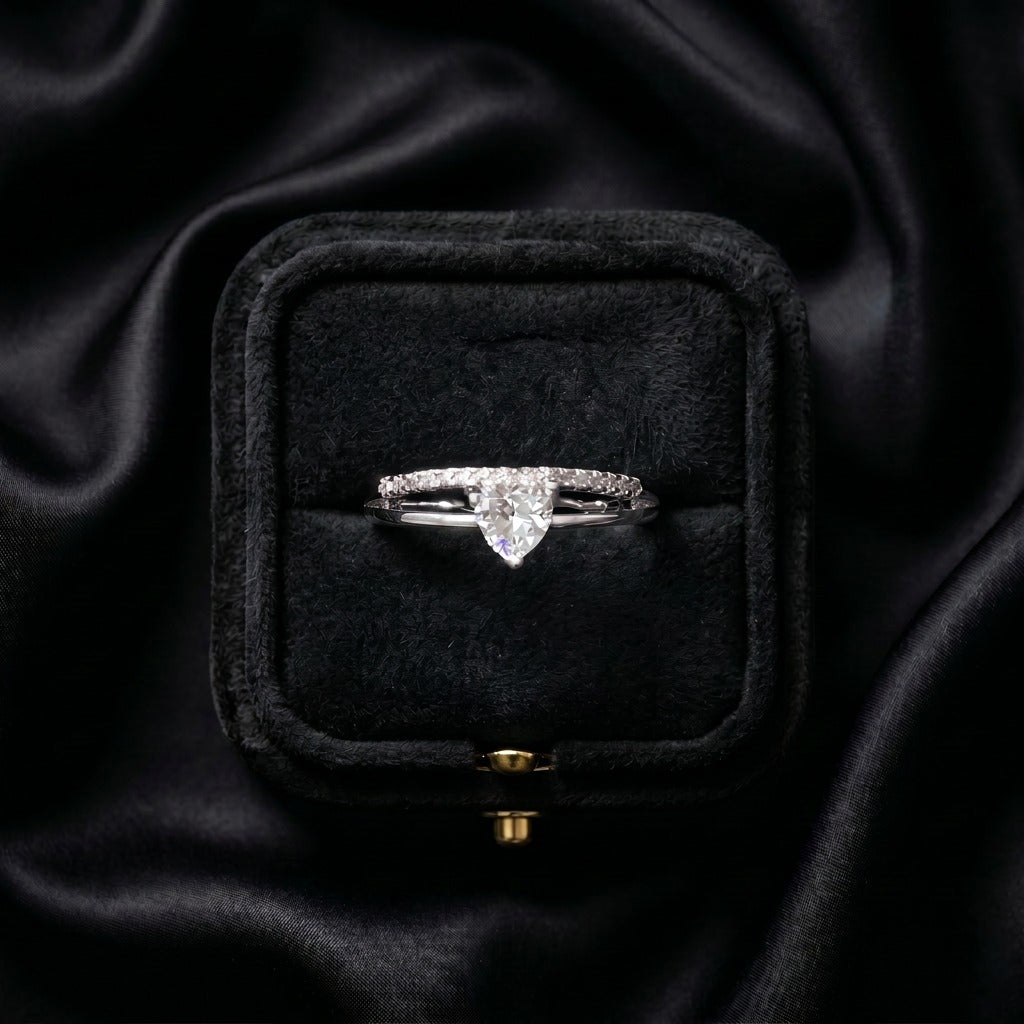 A tiny symbol of love wrapped in crystal sparkle, this ring captures the sweetness of a delicate heart glowing softly with light. Designed with a graceful silhouette and minimal elegance, it brings a romantic charm that feels subtle, timeless, and effortlessly beautiful.