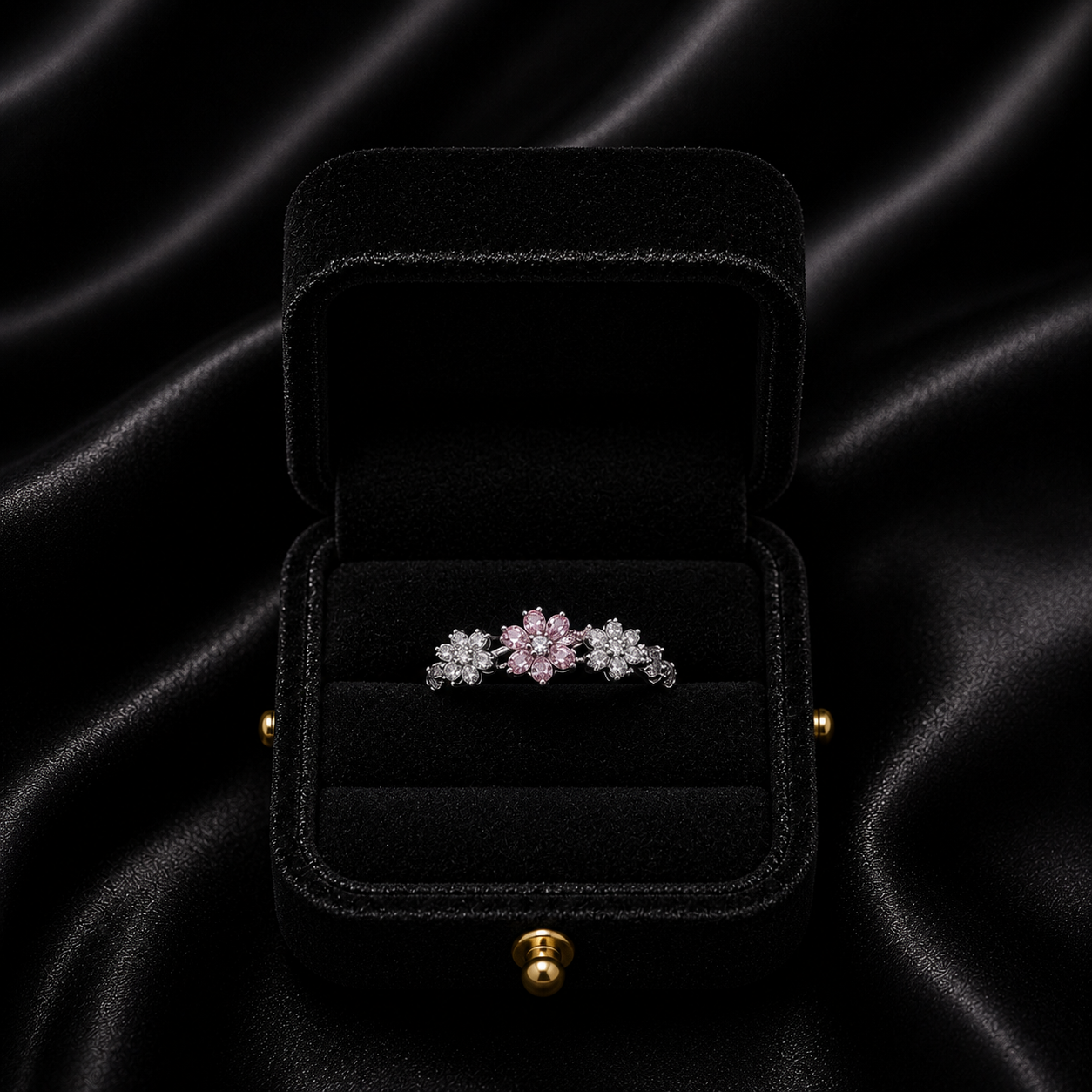 A delicate bloom of shimmering petals, this ring captures the soft elegance of tiny daisies frozen in crystal light. Designed with sparkling floral details and a graceful open silhouette, it brings a dreamy charm that feels both feminine and timeless.