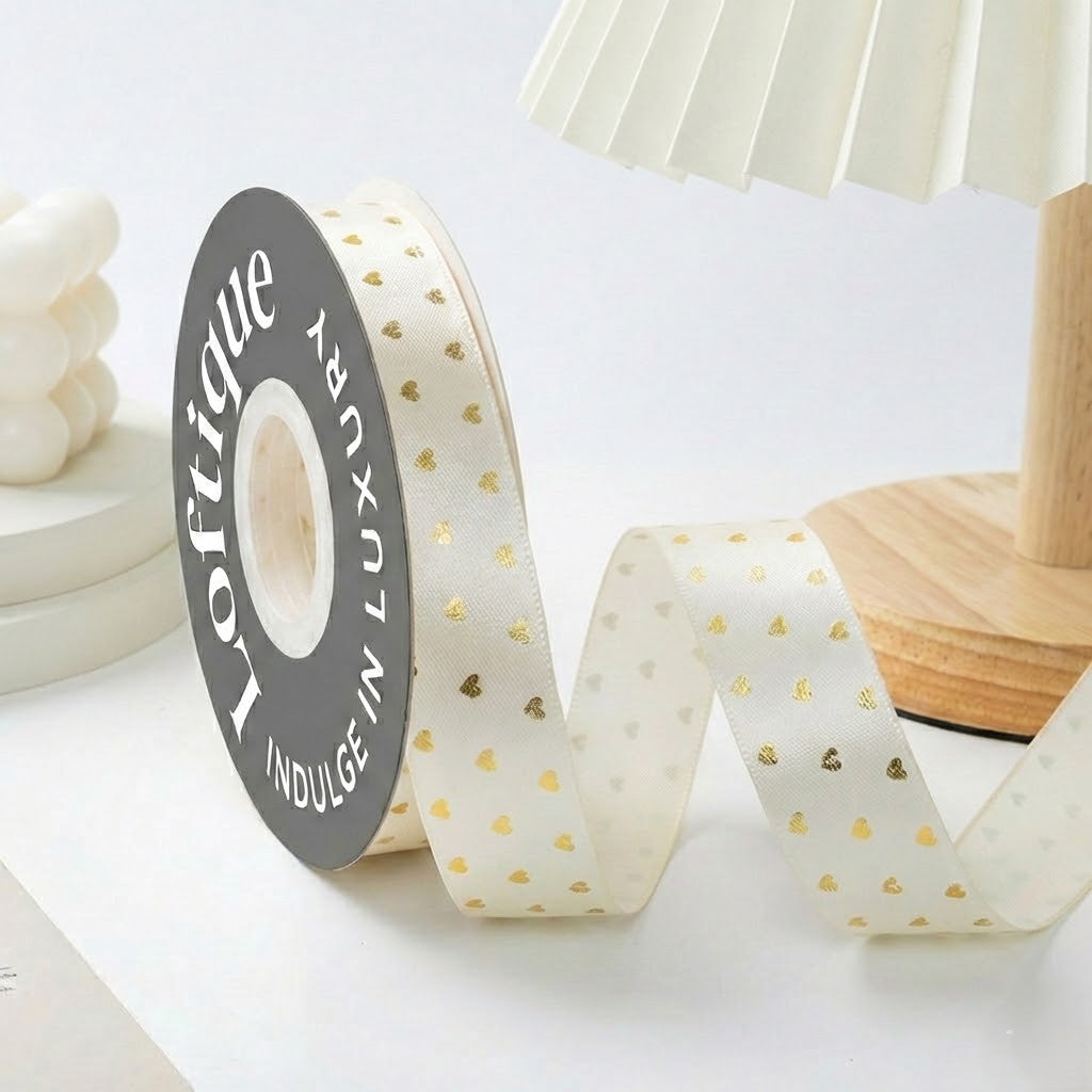 ES Ribbons are designed to add the perfect finishing touch to every gift. Crafted from soft fabric and detailed with elegant gold heart accents, these ribbons instantly elevate your packaging with warmth, love, and a premium feel.