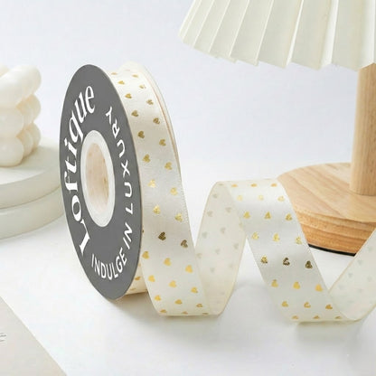 ES Ribbons are designed to add the perfect finishing touch to every gift. Crafted from soft fabric and detailed with elegant gold heart accents, these ribbons instantly elevate your packaging with warmth, love, and a premium feel.