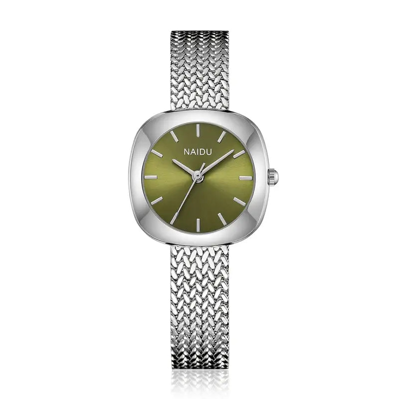Designed for effortless everyday style, the Lume Classic Watch features a refined sunray dial with slim pointer markers, framed in a polished square case and finished with a stainless-steel mesh strap that drapes beautifully on the wrist. Minimal, feminine, and timeless.