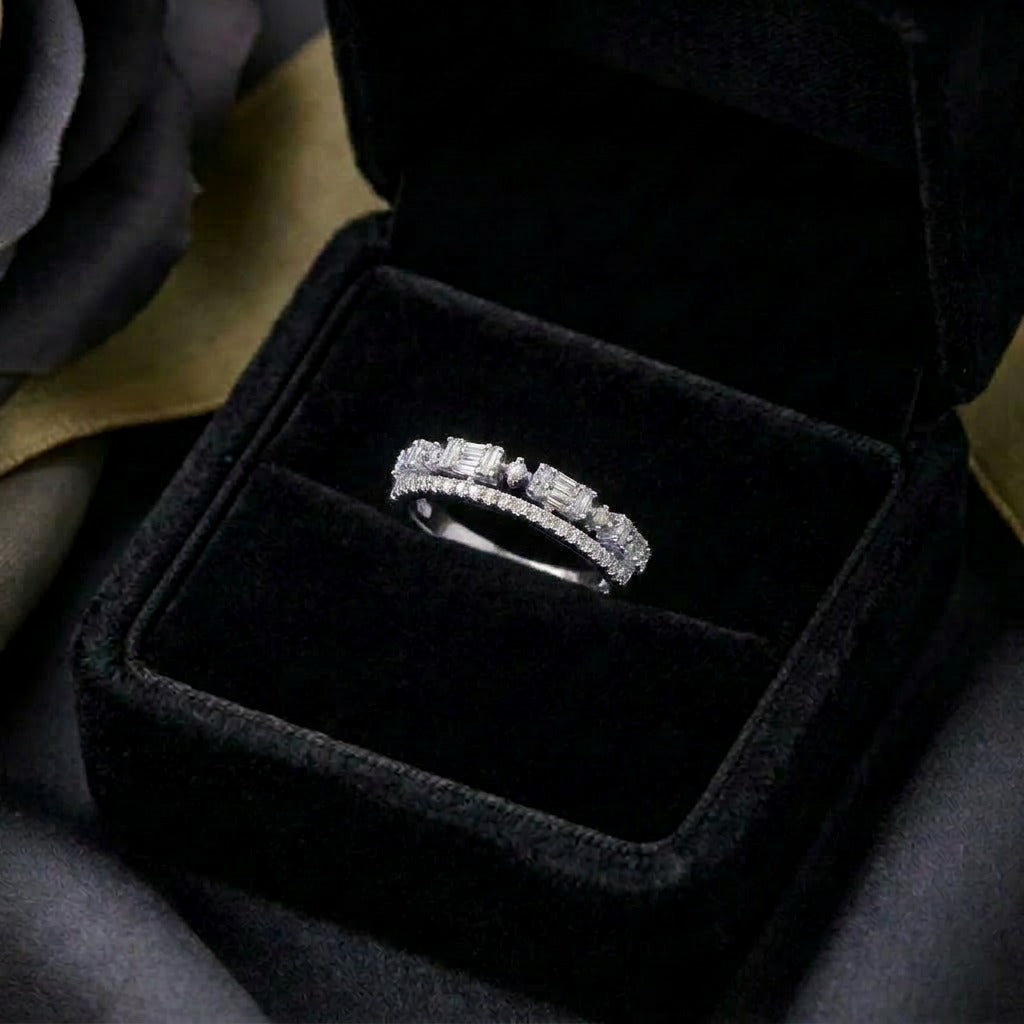 A delicate line of brilliance wrapped in timeless elegance, this ring features shimmering stones arranged in a graceful crown-like silhouette. Its refined band design and soft sparkle create a look that feels minimal, elegant, and effortlessly luxurious.