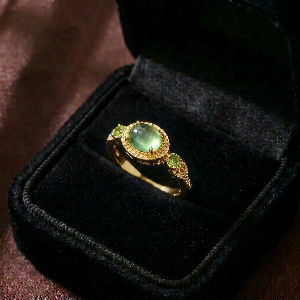 A regal touch inspired by laurel leaves and timeless elegance, this ring captures the beauty of a crowned silhouette wrapped around a luminous center stone. With its delicate olive-inspired details and refined sparkle, it creates a graceful charm that feels vintage, royal, and effortlessly sophisticated.