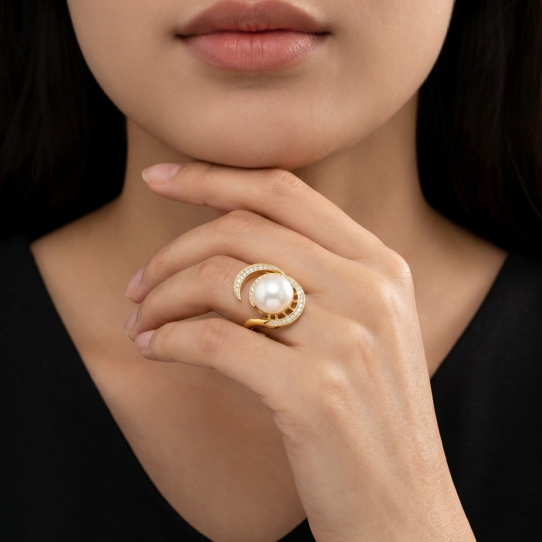 Channel your inner queen with the Pave Empress Ring, a piece that commands attention with its majestic presence. This ring features a brilliant artificial pearl encircled by a halo of light, creating a regal silhouette that is both powerful and breathtakingly feminine.