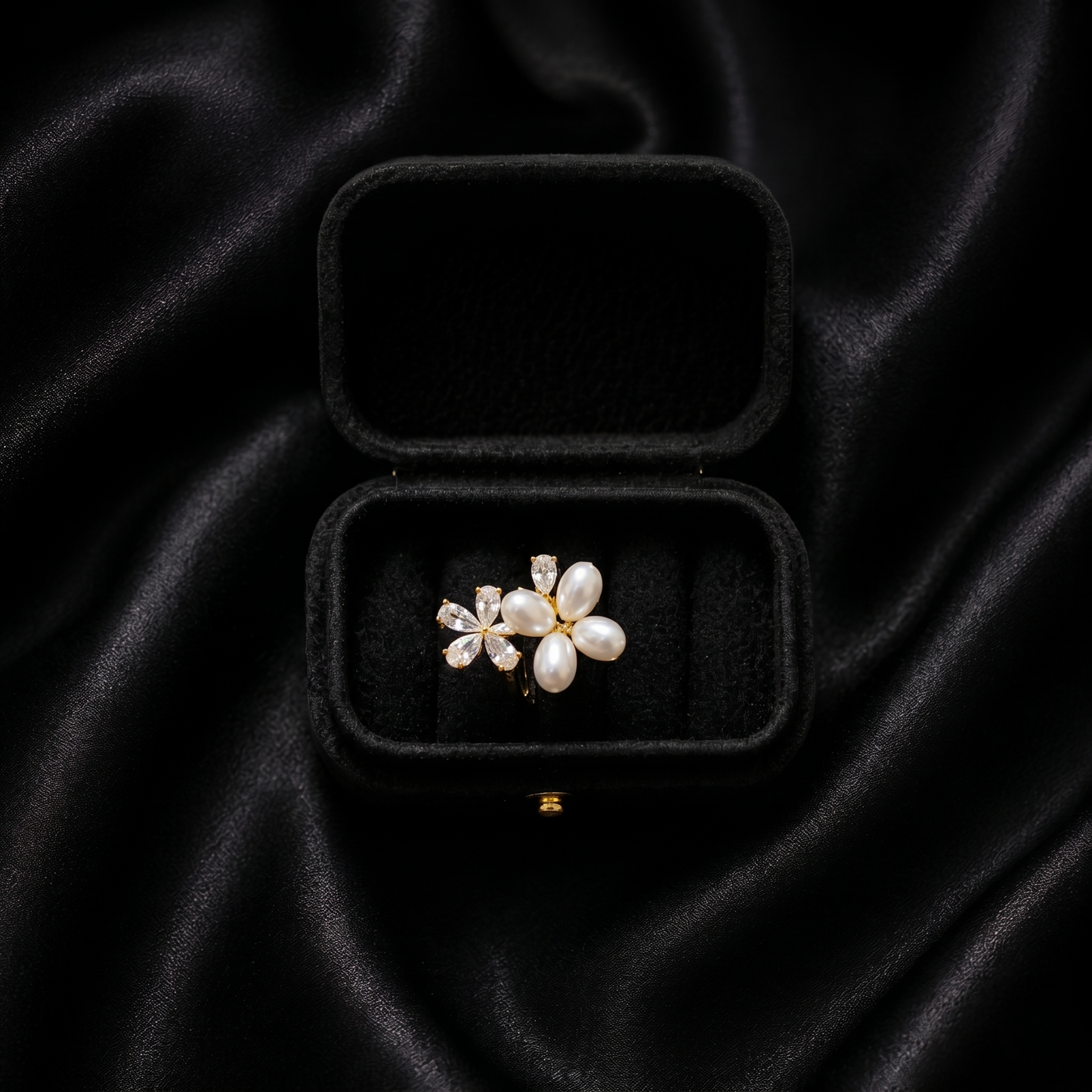 Let your style take flight with a piece that captures the delicate beauty of a garden in spring. The Pearl Papillon Ring features a breathtaking butterfly-inspired floral design, blending the soft luster of pearls with a high-fashion golden glow. It’s a whimsical yet sophisticated statement piece that adds a touch of ethereal charm to any outfit.