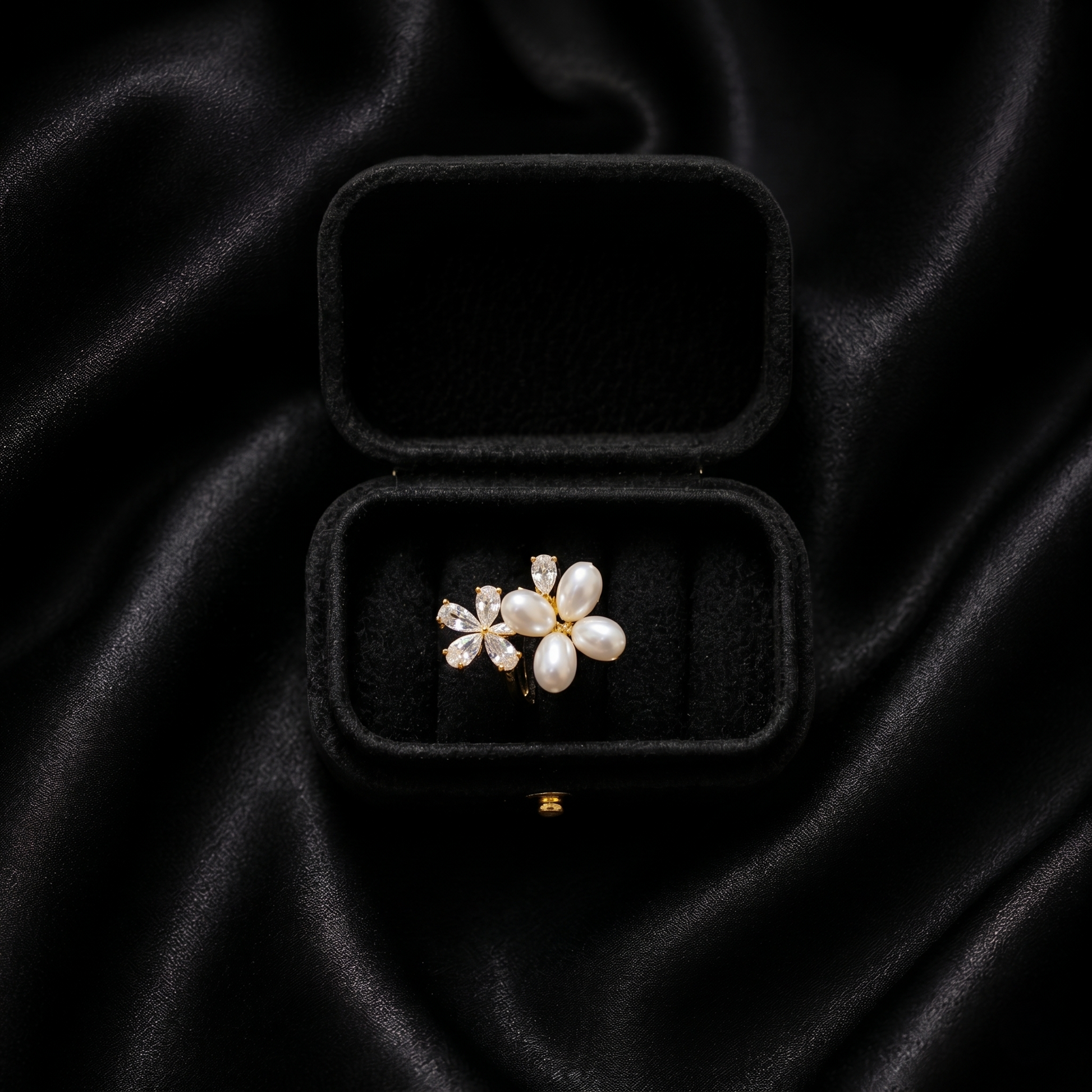 Let your style take flight with a piece that captures the delicate beauty of a garden in spring. The Pearl Papillon Ring features a breathtaking butterfly-inspired floral design, blending the soft luster of pearls with a high-fashion golden glow. It’s a whimsical yet sophisticated statement piece that adds a touch of ethereal charm to any outfit.
