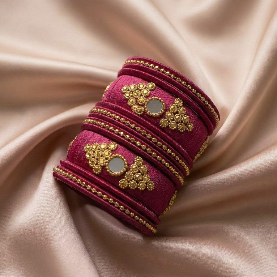 Crafted with rich silk thread and adorned with intricate golden embellishments, the Reshmi Bangles bring a bold festive charm to your look. Each stack carries a unique handcrafted touch — making every piece slightly different, yet equally stunning.